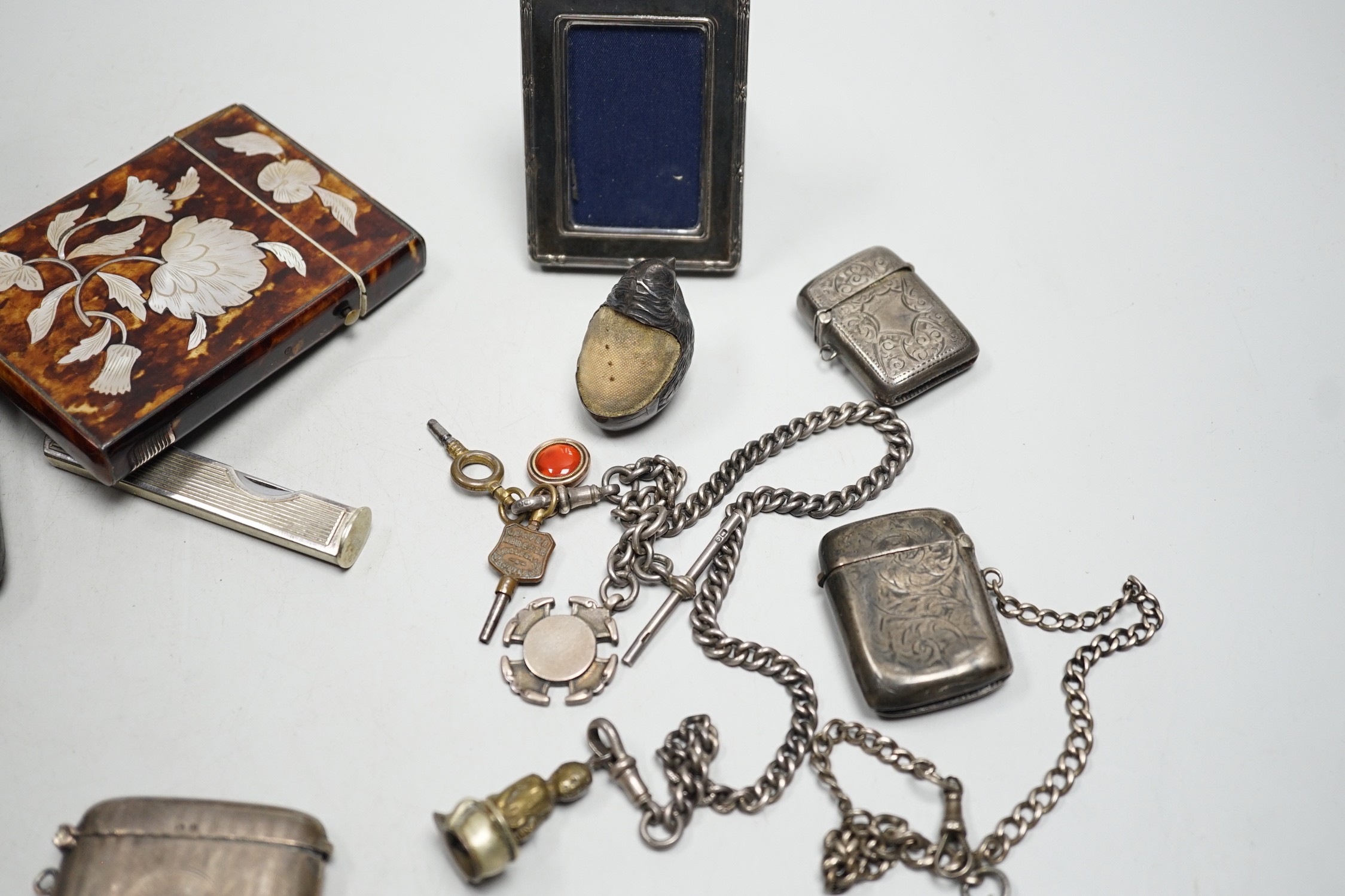 A cased pair of Edwardian silver shell salts, with spoons, and other items including Edwardian silver mounted bird pin cushion, by Sampson Mordan & Co, vesta cases, inlaid tortoiseshell card case etc.